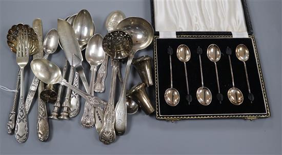 A group of small silver flatware including a Victorian sifter spoon, christening pair etc and a pair of pepperettes.